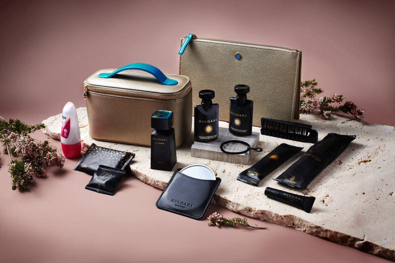 a group of cosmetics on a rock Emirates Bulgari