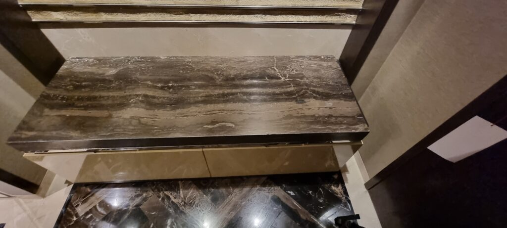 a marble bench in a room