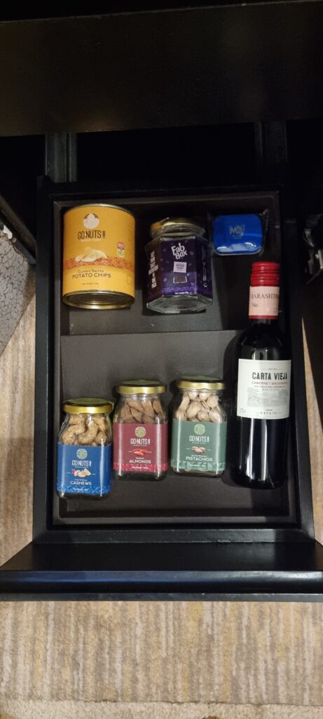 a drawer full of food and drinks