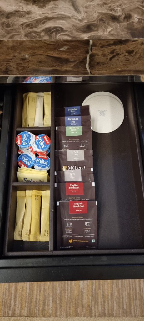 a drawer with different types of coffee