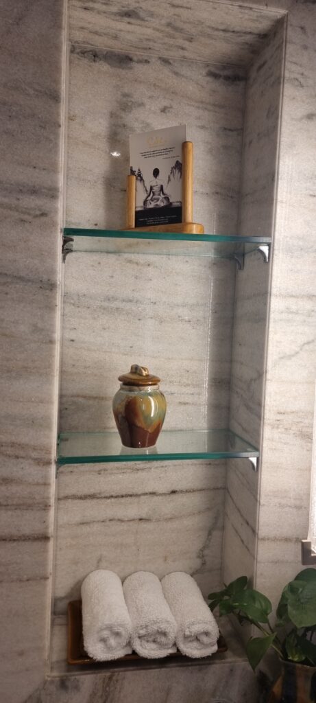 a glass shelf with a picture on it