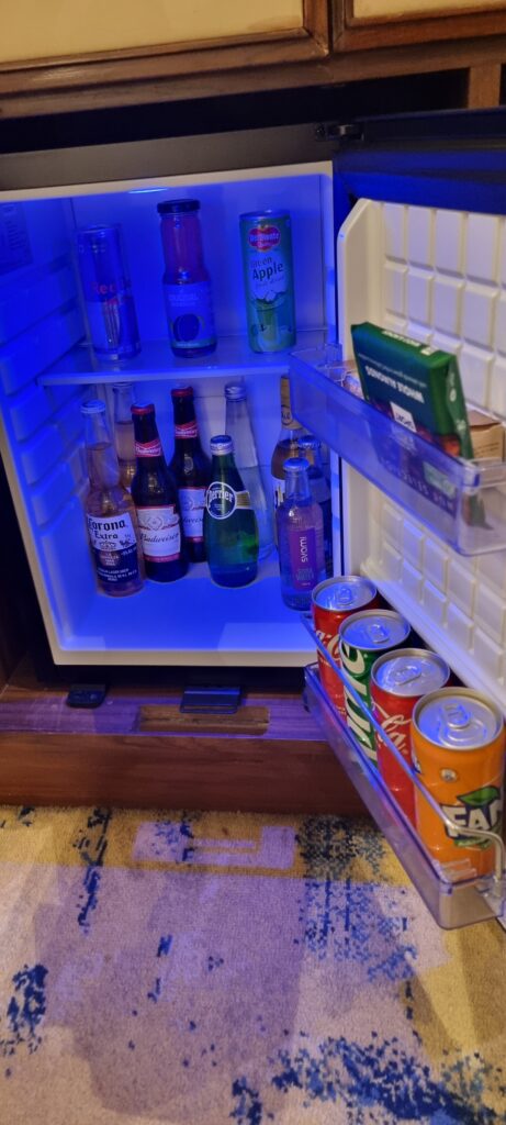 a refrigerator with bottles and cans mini bar Shangri-la