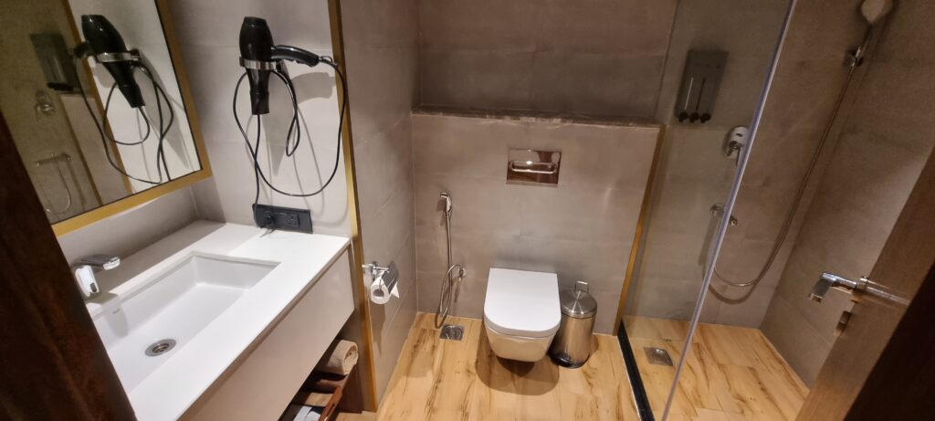 a bathroom with a toilet and sink