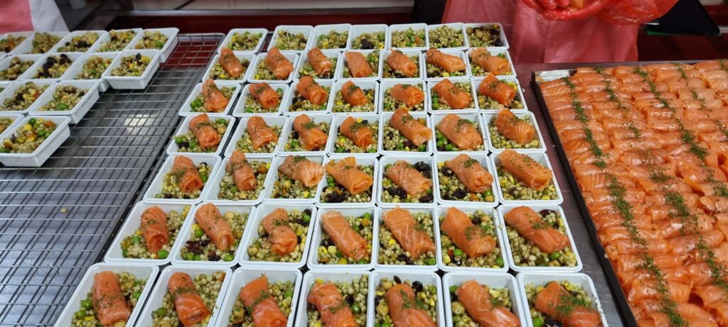 a tray of food on a table Hermolis kosher airline food