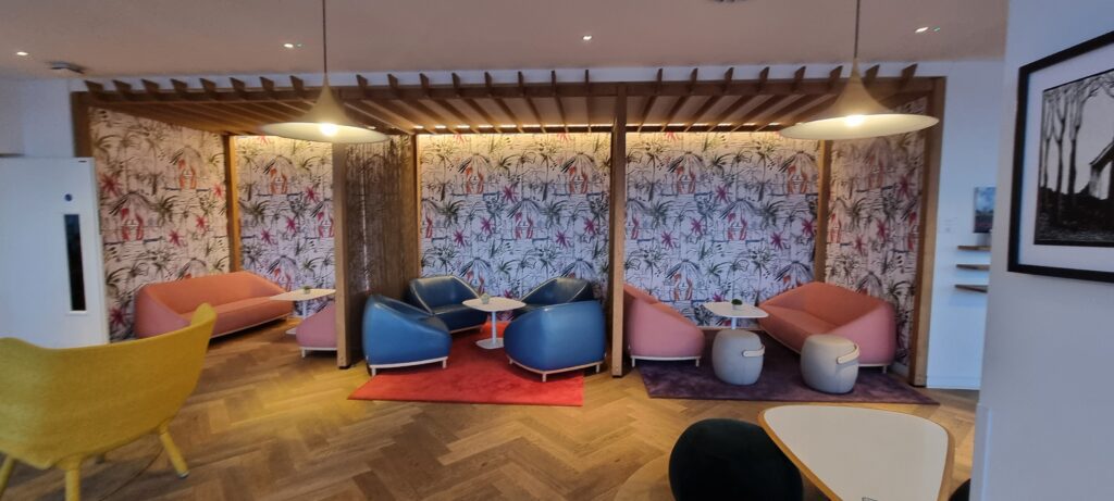 a room with chairs and tables Review Plaza Premium Gatwick