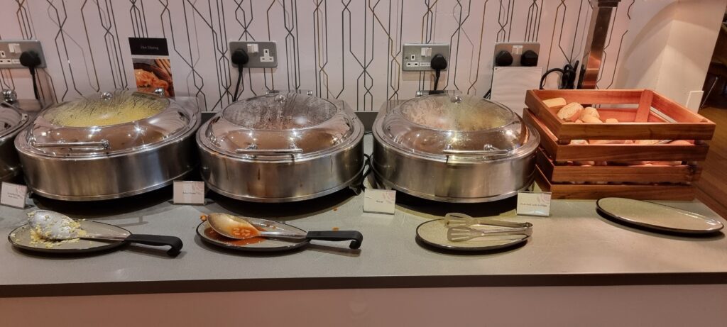 a two pans with lids on a counter