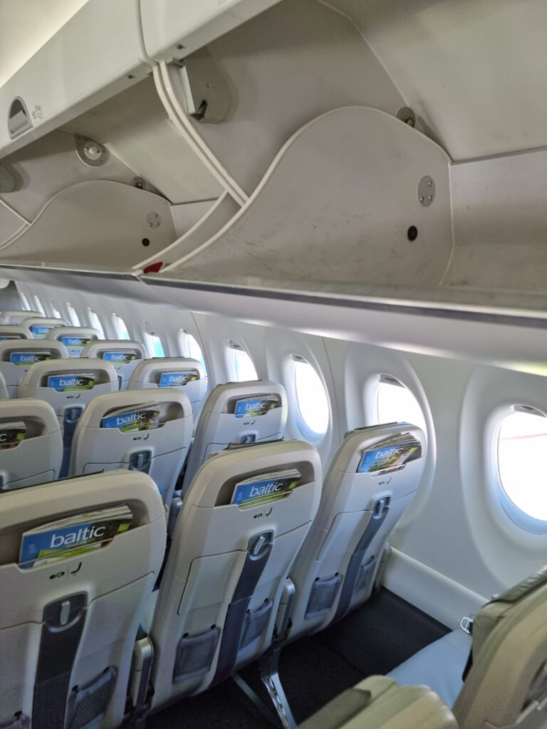 an airplane with rows of seats airline