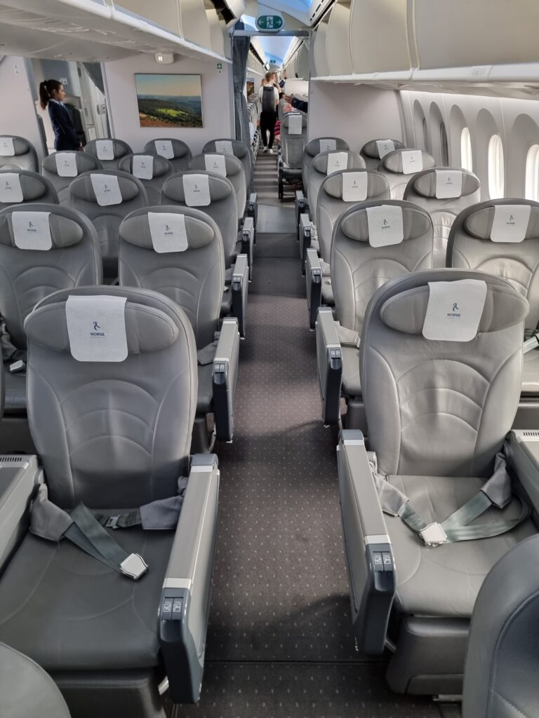 a row of seats on an airplane Norse Atlantic