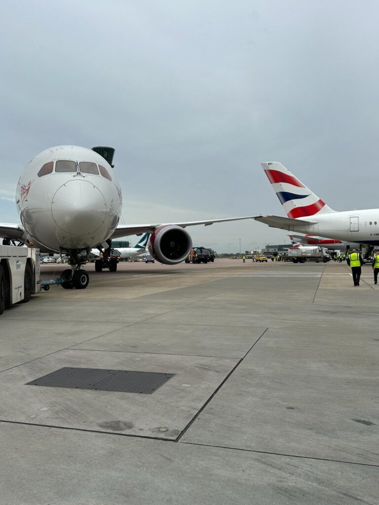 a group of airplanes on a runway airbus