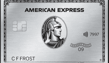 a silver credit card with a picture of a man in a helmet American Express Platinum Card