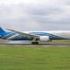 a plane on the runway Oman Air oneworld membership