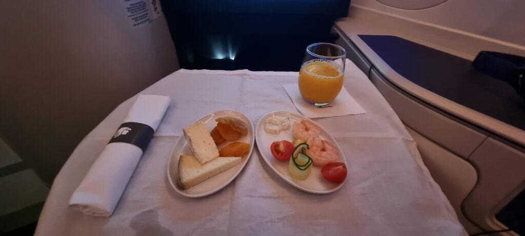 plates of food on a table Aeromexico business class