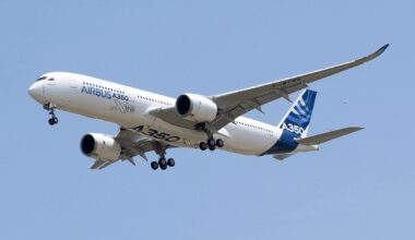 a large white and blue airplane Korean Air A350