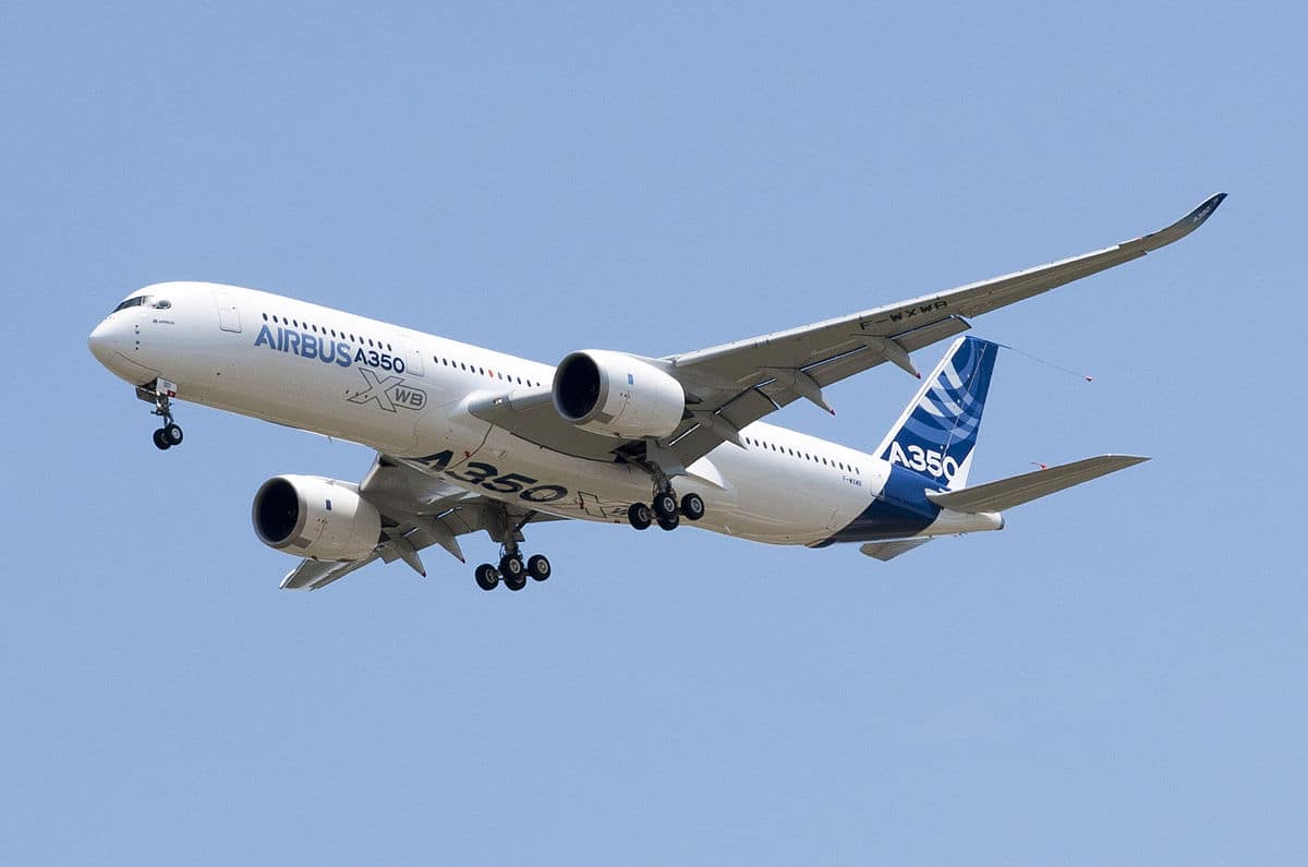 a large white and blue airplane Korean Air A350