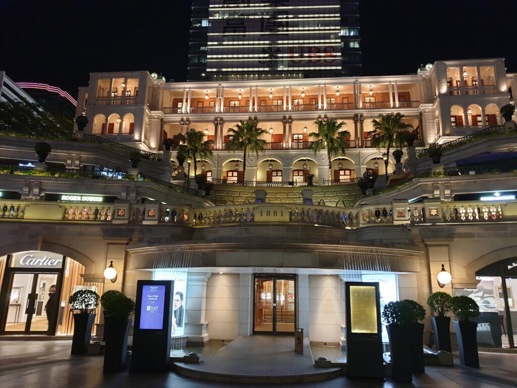 a building with many balconies and stairs China visa