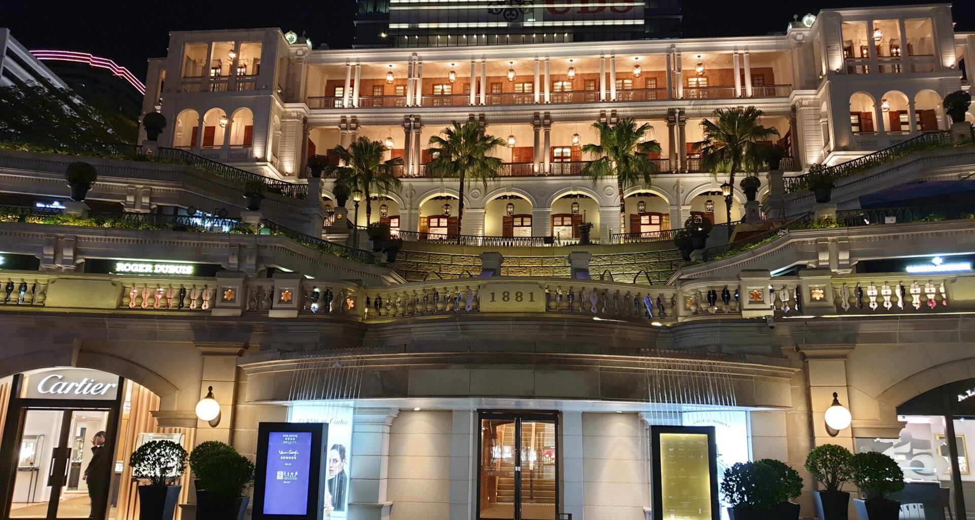 a building with many balconies and stairs China visa