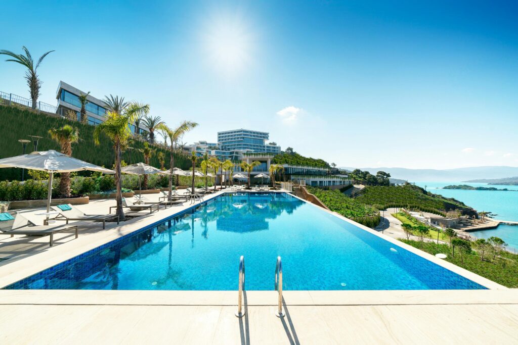 a pool with a building in the background Radisson