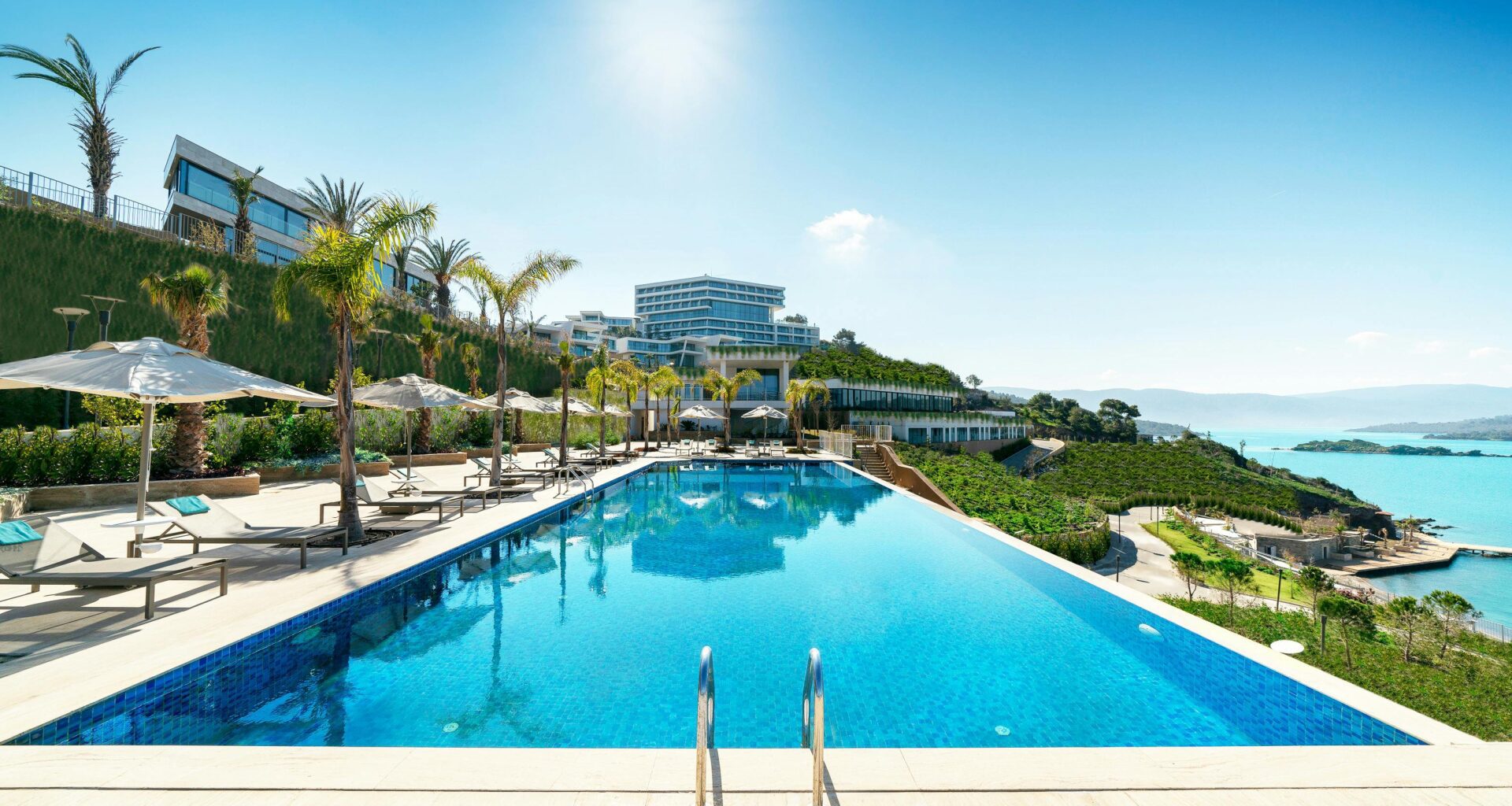 a pool with a building in the background Radisson