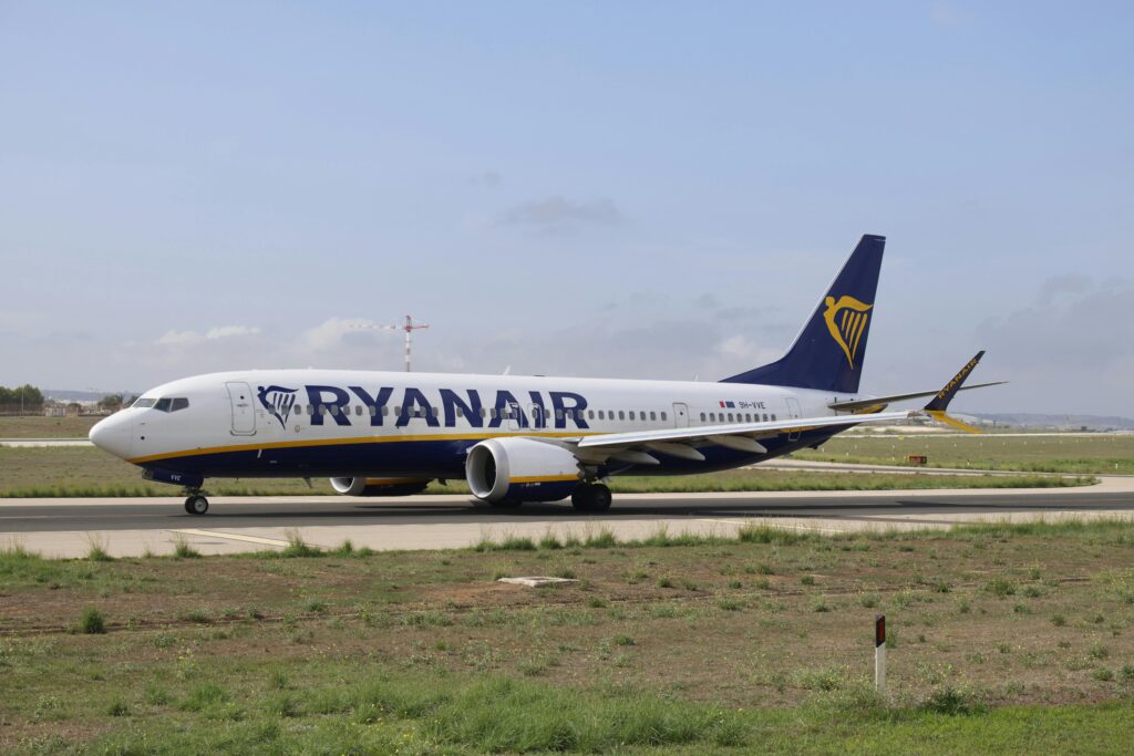 a large airplane on a runway Ryanair Prime subscription