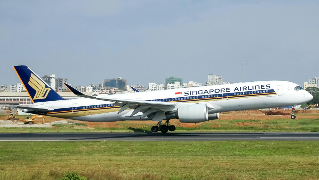 a large airplane on a runway Batteries power banks