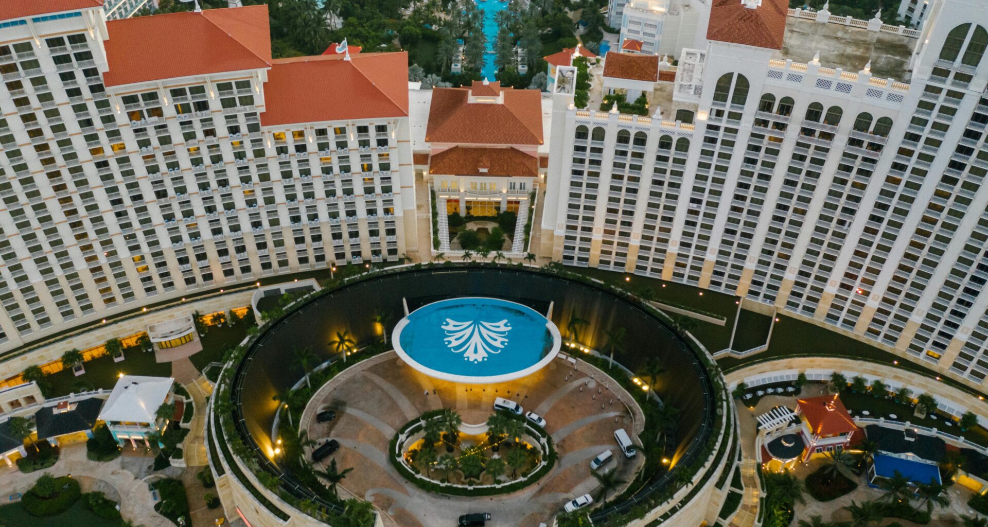 a large building with a pool and a pool in it World of Hyatt