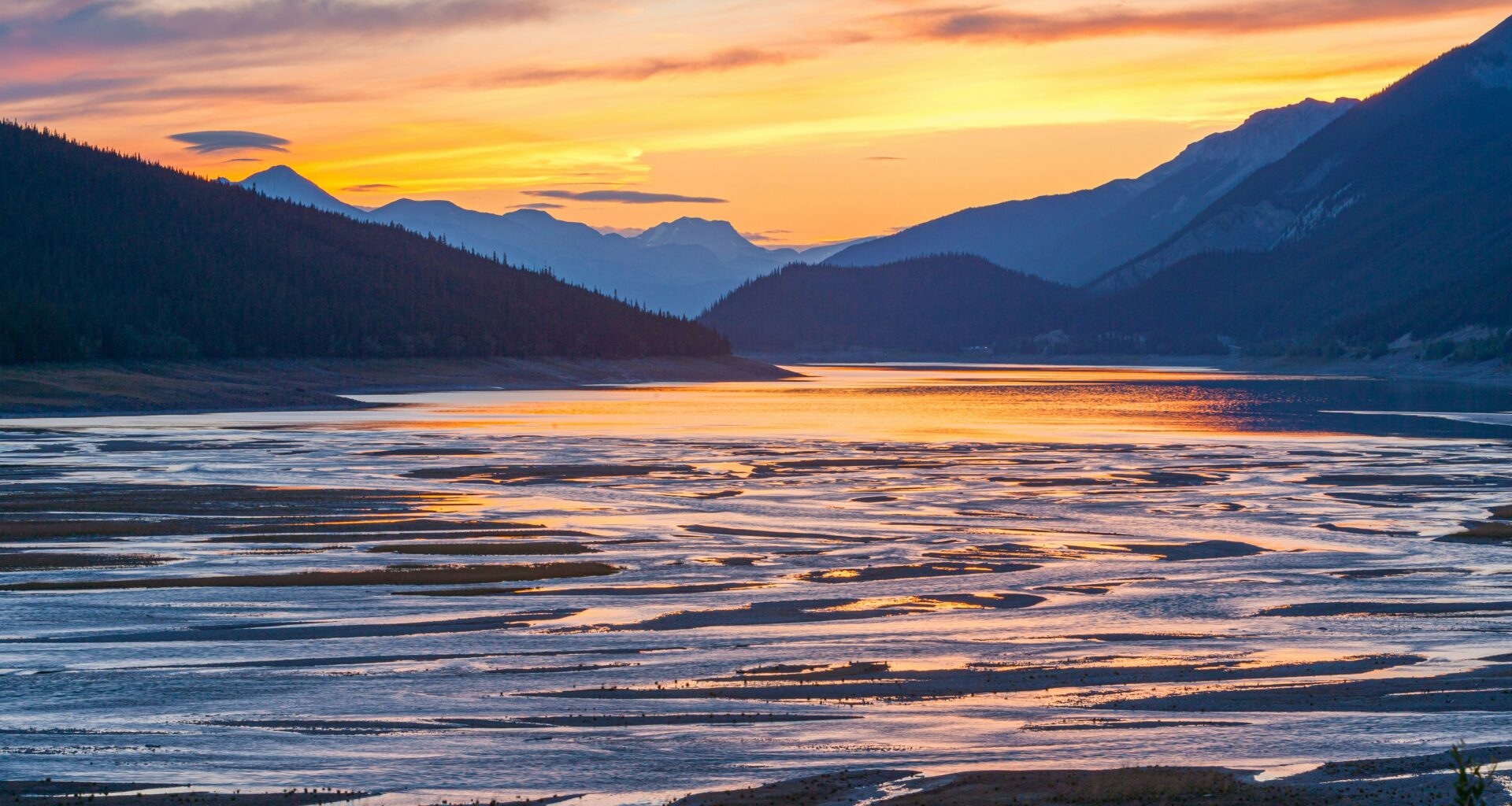 a sunset over a lake American Express Rewards Credit Card