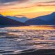 a sunset over a lake American Express Rewards Credit Card