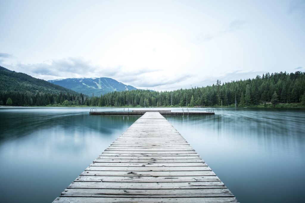a dock leading to a lake BA Amex Business Card