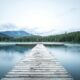 a dock leading to a lake BA Amex Business Card