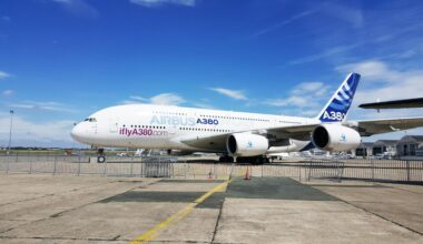 a large white airplane on a runway Global Airlines A380