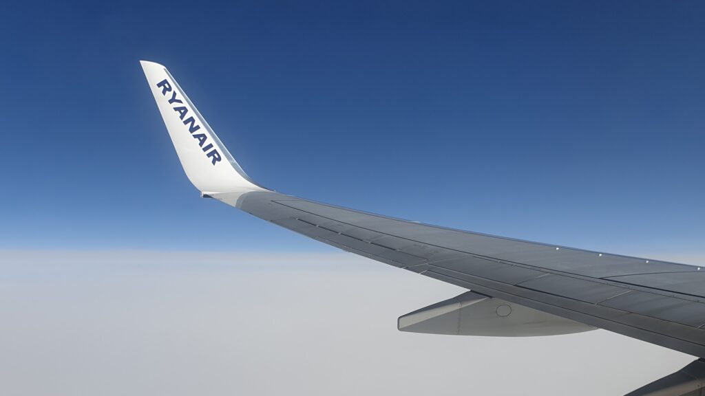 the wing of an airplane Ryanair Spirit easyJet