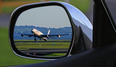 a rear view mirror of an airplane taking off Gatwick drop-off charges