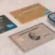 a group of credit cards and a cell phone British Airways American Express
