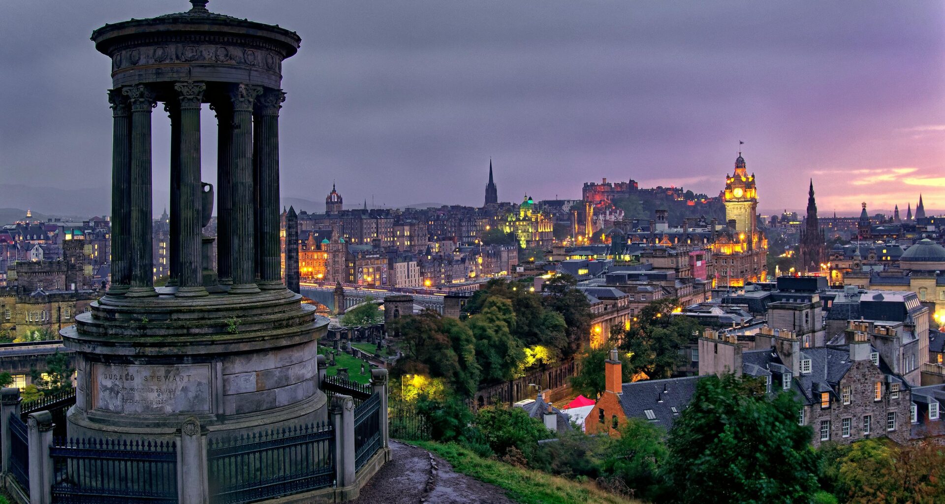 a cityscape with a monument and buildings Edinburgh Marriott Hotel