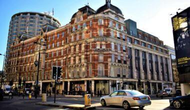 a building with a flag on it Amex Platinum Harvey Nichols credit