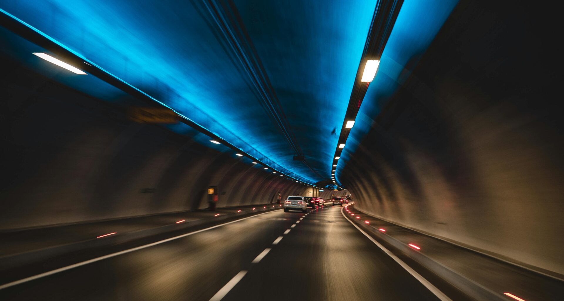 a car driving through a tunnel