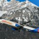 a plane flying over a mountain Nothing Beats a Jet2Holiday
