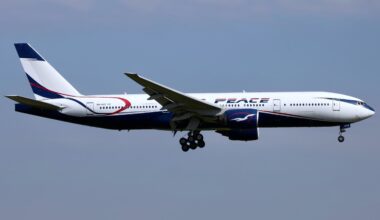 a plane flying in the sky Air Peace London