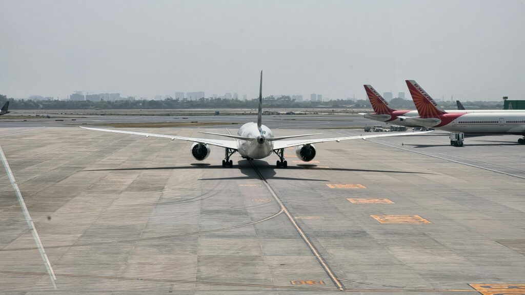 a plane on the runway premium flyer tax