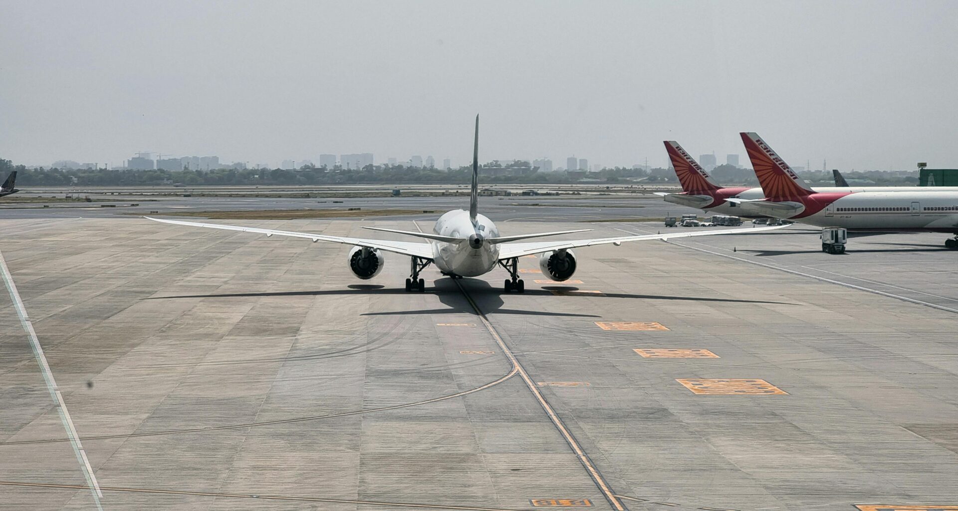 a plane on the runway premium flyer tax