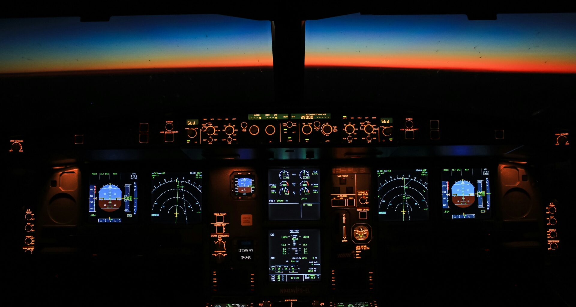 a cockpit of an airplane with a view of the sunset cameras in aircraft cockpits