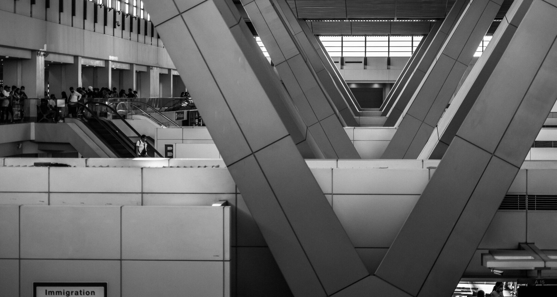 a black and white photo of a building EU Entry/Exit System launch date