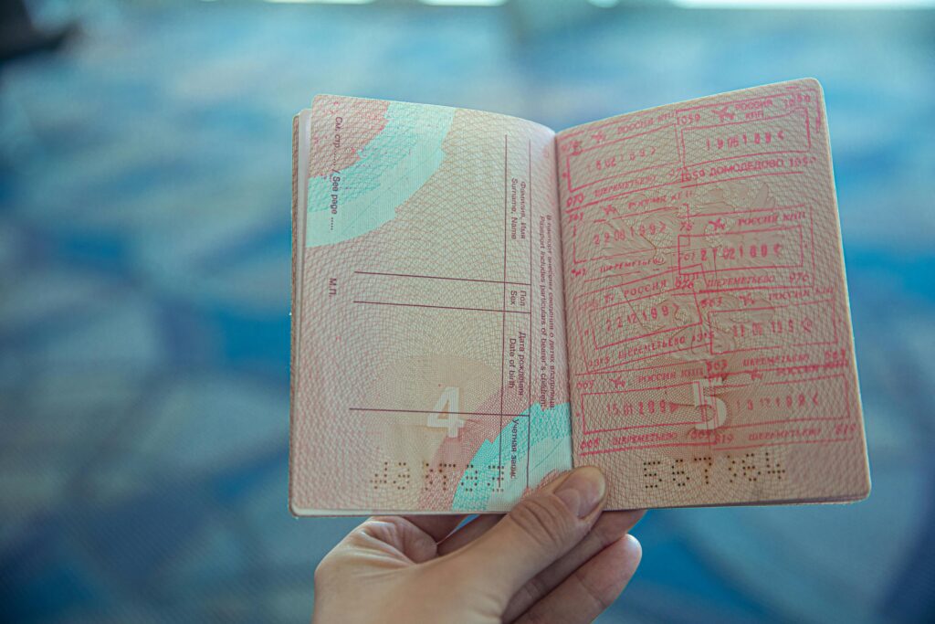 a hand holding a passport EU Entry/Exit System launch date