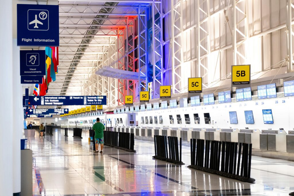 a man walking in a large airport British Airways compensation UK261