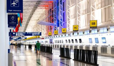 a man walking in a large airport British Airways compensation UK261