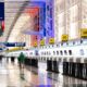 a man walking in a large airport British Airways compensation UK261