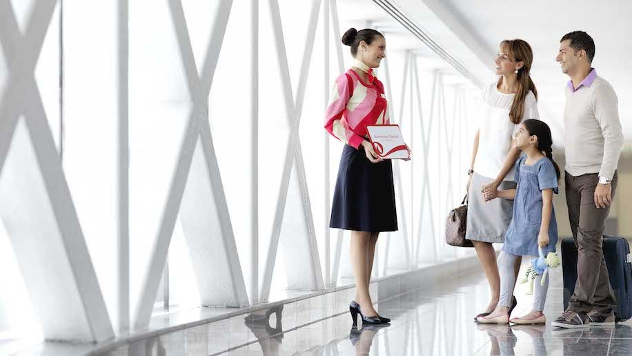 a woman talking to another woman Manchester Airport meet and greet