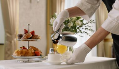 a person pouring coffee into a cup complimentary coffee in hotels