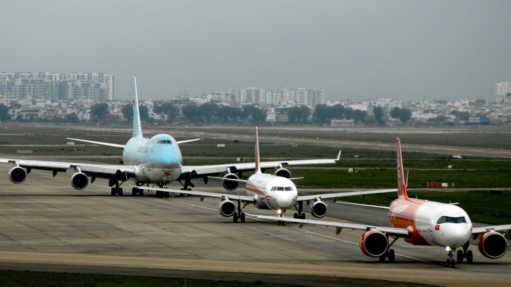 airplanes on a runway Boeing Airbus name origin