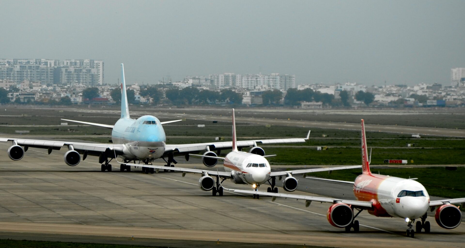 airplanes on a runway Boeing Airbus name origin